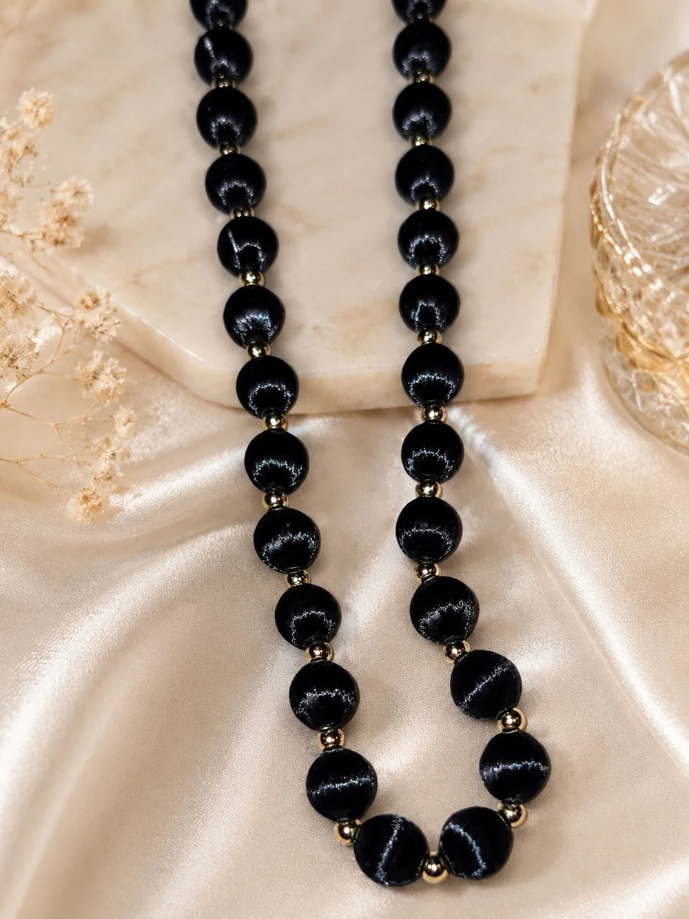 Classic Black Bead Necklace with Gold Accents